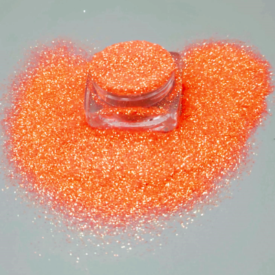 Candy Sparkling Effect Glitter 5g; a loose orange glitter makeup.