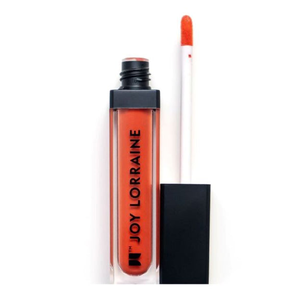 Indigenous Matte Lip - Taumalin: A vibrant orange liquid lipstick with rich pigmentation and long-lasting, weightless matte wear. 