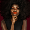 bright orange liquid lipstick with a smudge-resistant, long-lasting matte finish and bold, full-coverage color.