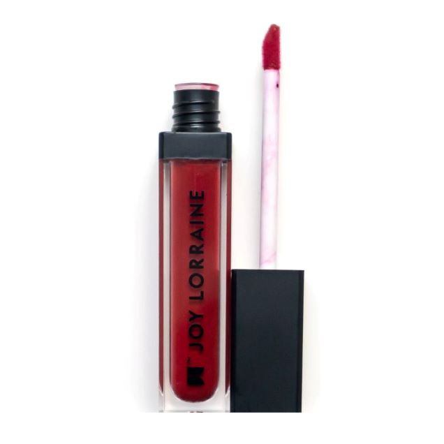 Roucou Liquid Lipstick; a vibrant red matte lipstick.