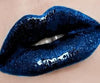 Blue shimmer lip gloss with peppermint oil for a cooling, moisturizing and glossy finish.